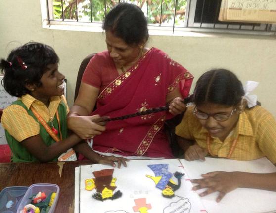 Eyes and ears of the students:These teachers are admirably committed to the service of children and young adults with deafblindness. (right) Jayanthi Narayanan.